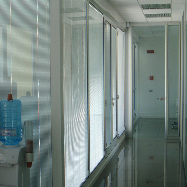 Realizzazione facciata, infissi e pensilina